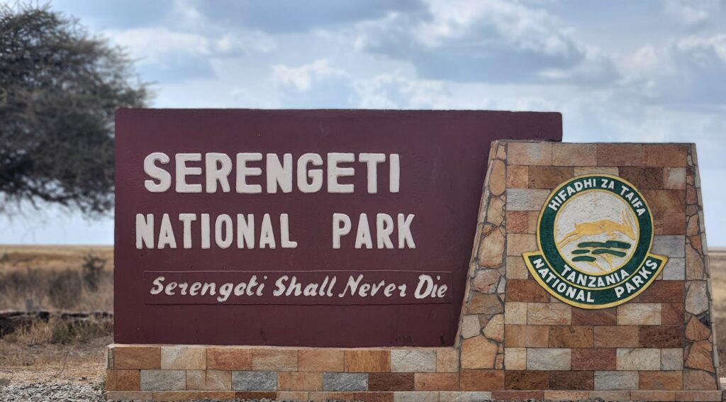 burgundy Serengeti sign with white letters