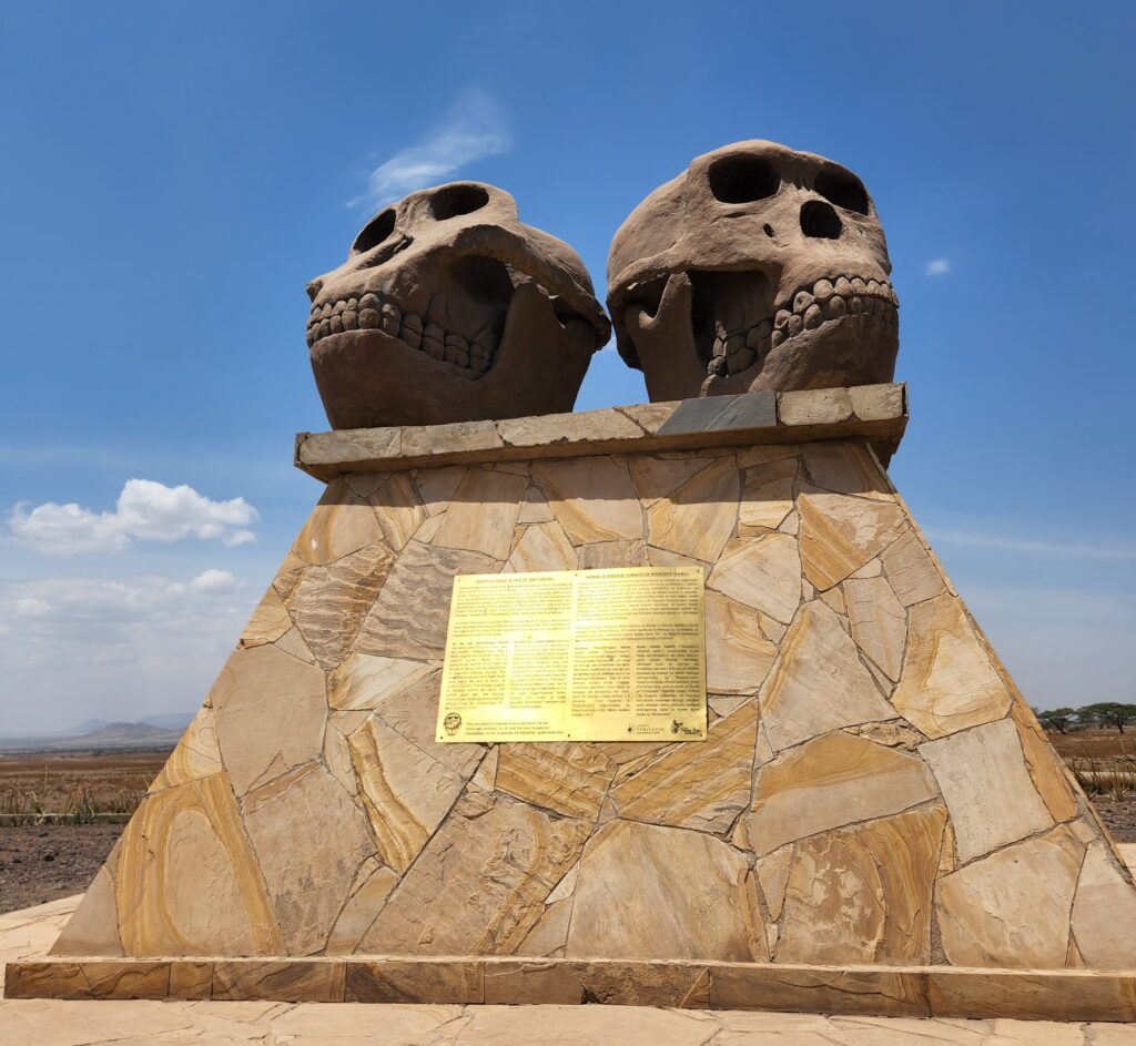 two skulls atop platform