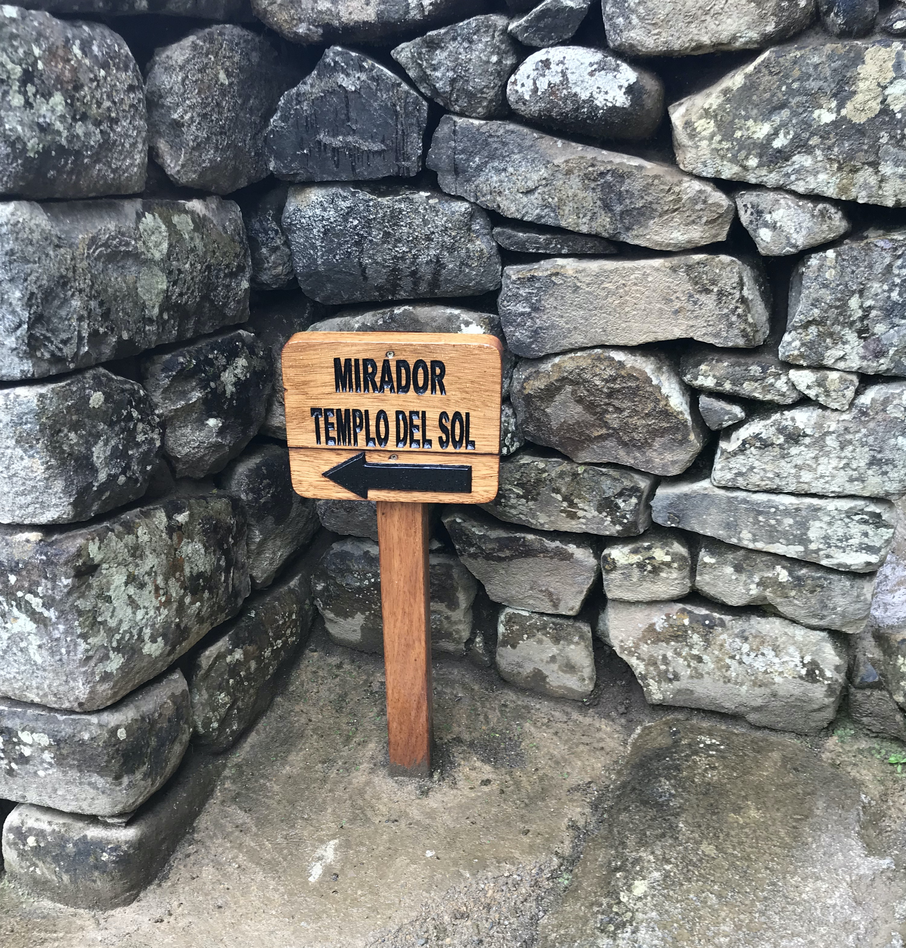Sign leading to Sun Temple at Machu Picchu